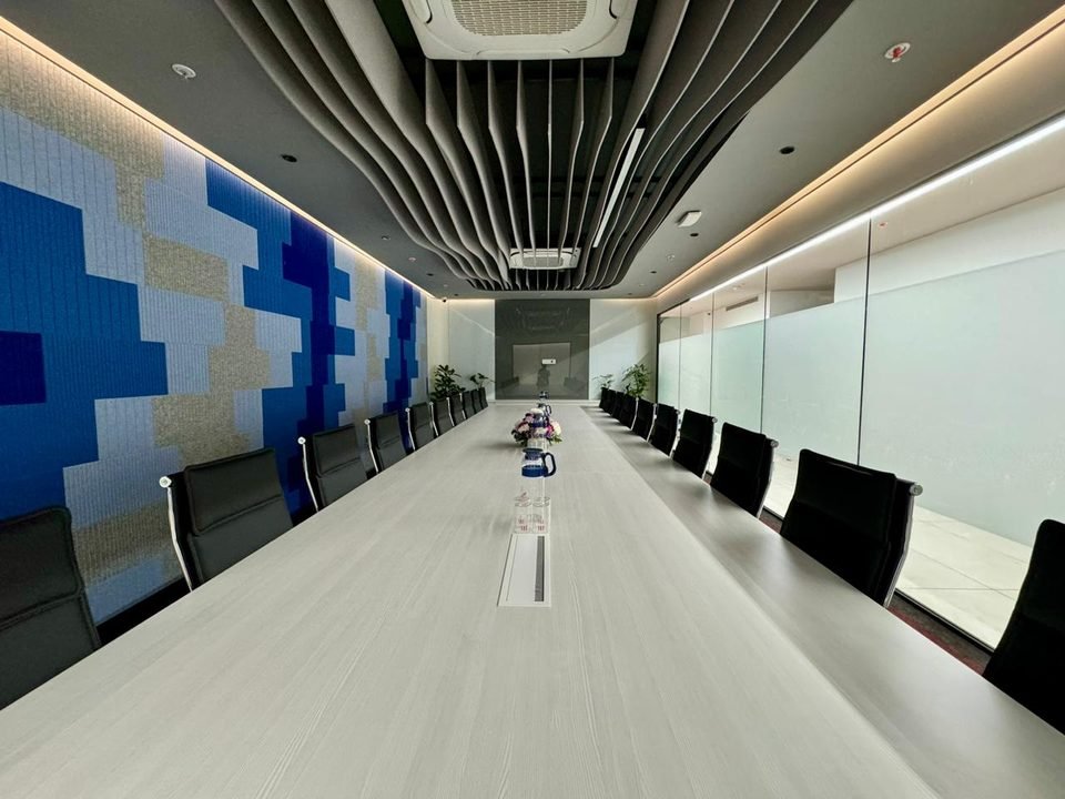 Main boardroom with acoustic ceiling baffles
